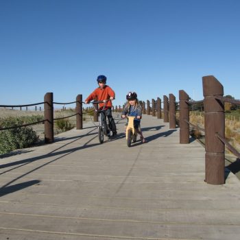 kids-biking-along-caroline-bay-board-walk-di-hay